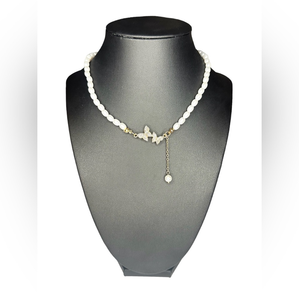 Faux pearl with gold color butterfly necklace